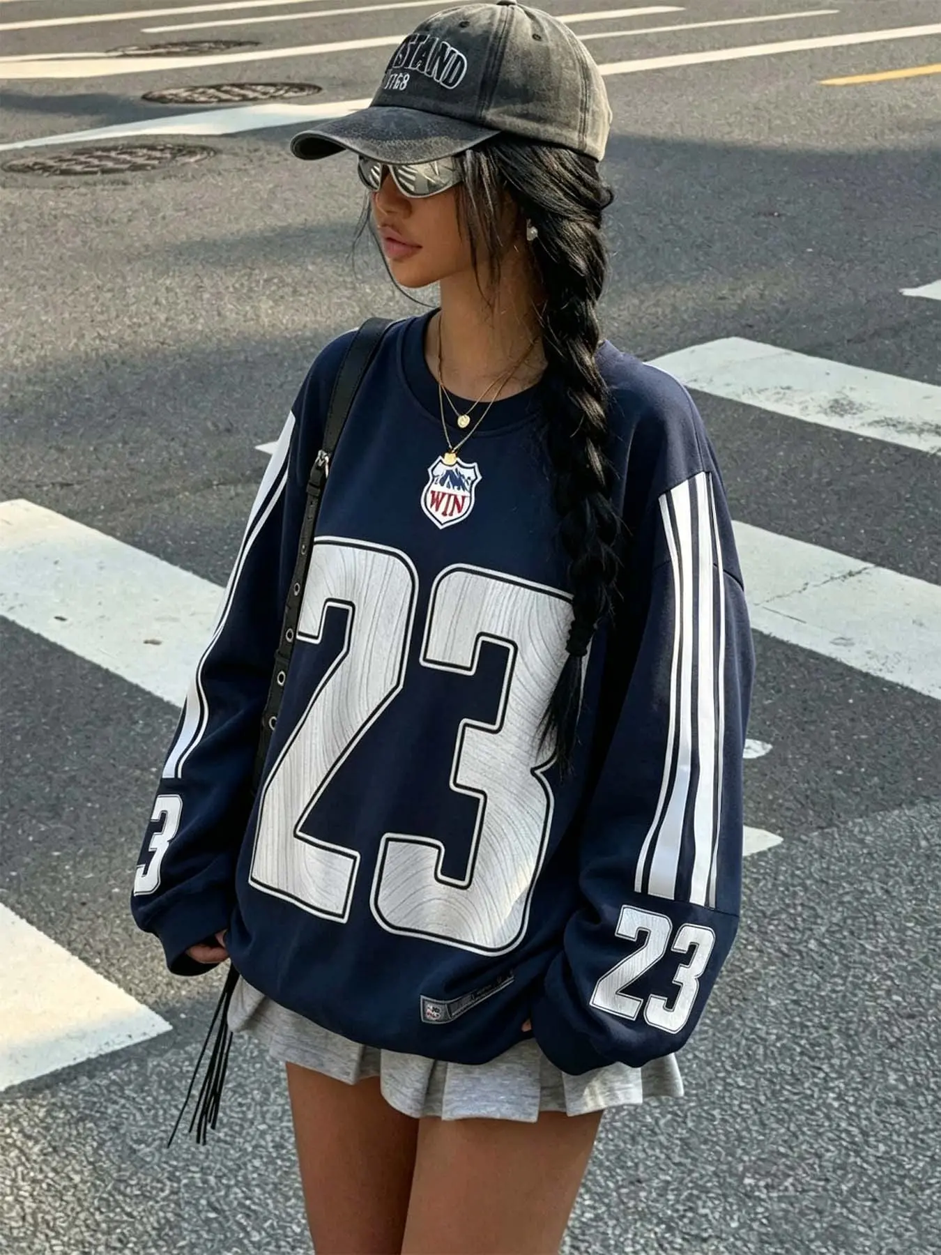 Dark blue No. 23 patterned crewneck sweatshirt, vintage striped long-sleeve loose pullover, relaxed casual sports aesthetic outfit, a fashionable casual long-sleeve top for everyday wear, shopping, and street-style styling