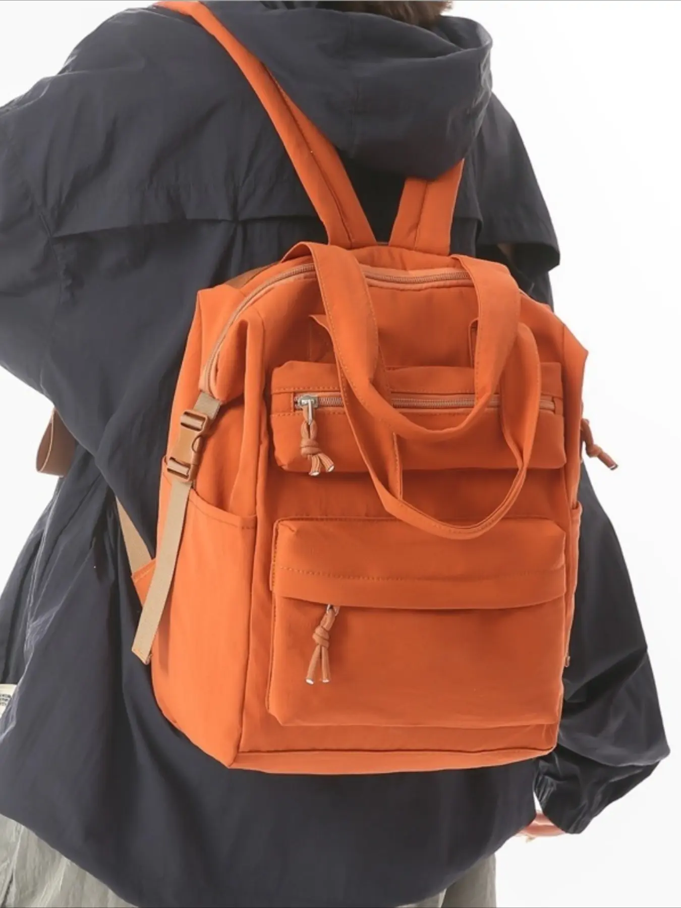 Street fashion nylon backpack with stitched seams, multi-pocket lightweight handbag for commuting, shopping, short trips, and school.