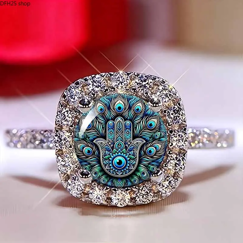 Hamsa Hand Evil Eye Statement Ring for Women and Men, Blue Peacock Feather Pattern with Crystal Halo, Unisex Symbolic Jewelry for Daily Wear and Gifts