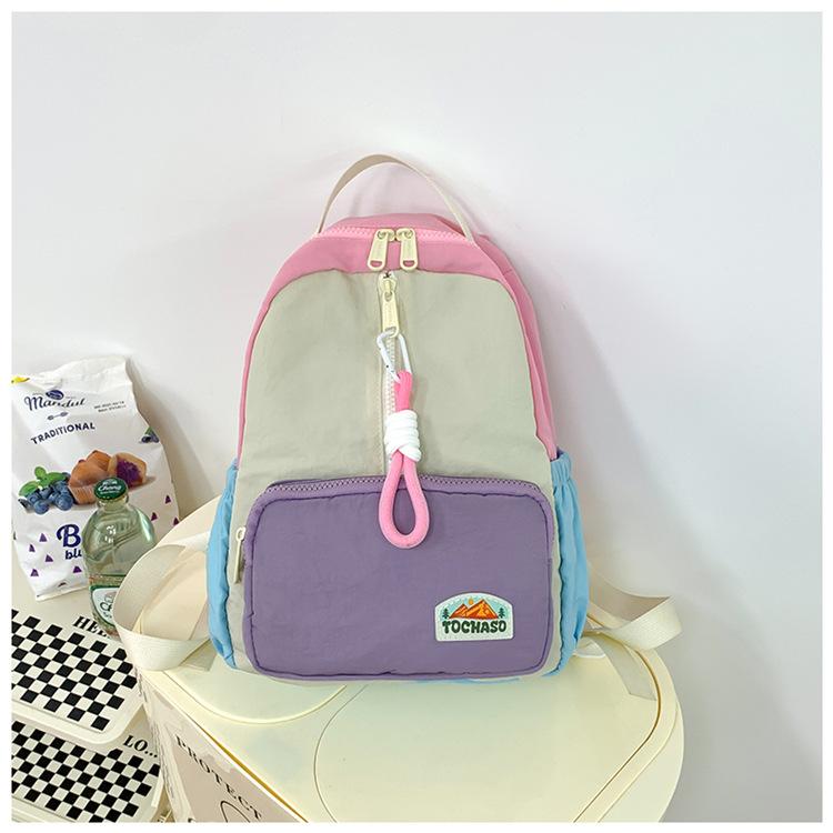 Boys' and girls' backpack 2026 new fashion color-blocking kindergarten baby school bag large capacity children's backpack