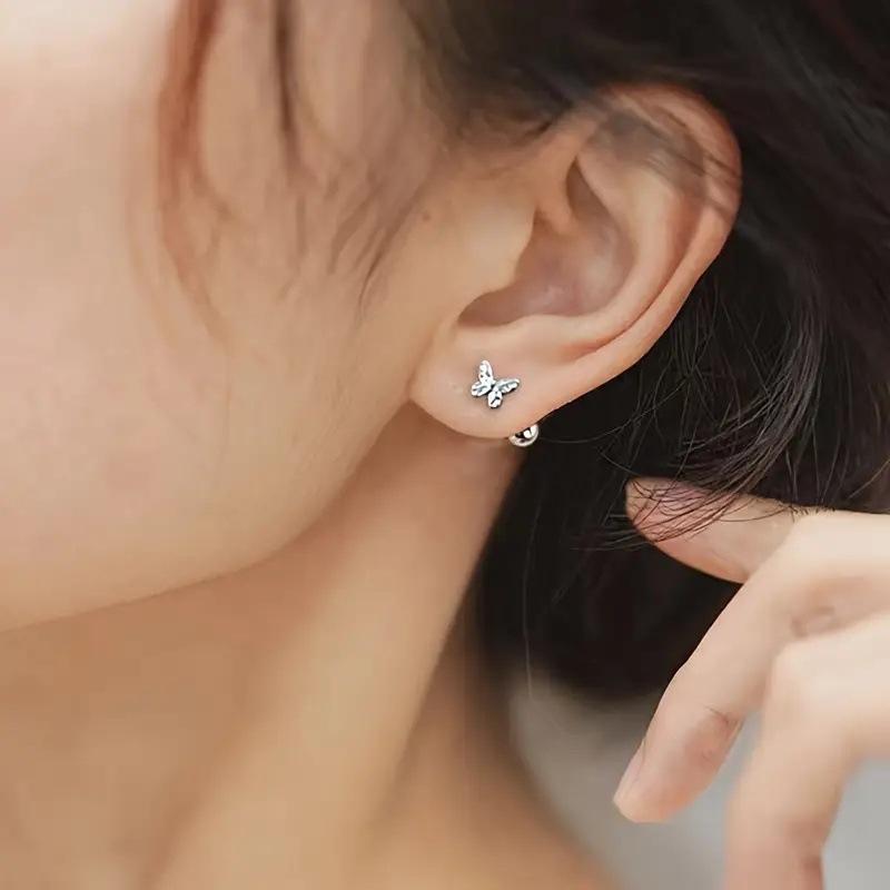 New handmade beaded pearl and rhinestone bracelet for women, Bohemian style, fashionable heart-shaped bracelet. Korean version. Fresh and elegant hollowed-out bow-shaped ear stud for women, screw fastened. Summer ear jewelry for women.