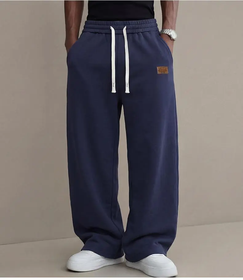 Men’s casual pants for autumn, cotton-blend stretch fabric, comfortable athletic-casual long pants with a loose straight fit; suitable for everyday wear and commuting; versatile sweatpants with drawstring; simple men’s casual pants. Men’s casual pants for autumn, cotton-blend stretch fabric, comfortable athletic-casual long pants with a loose straight fit; suitable for everyday wear and commuting; versatile sweatpants with drawstring; simple men’s casual pants.