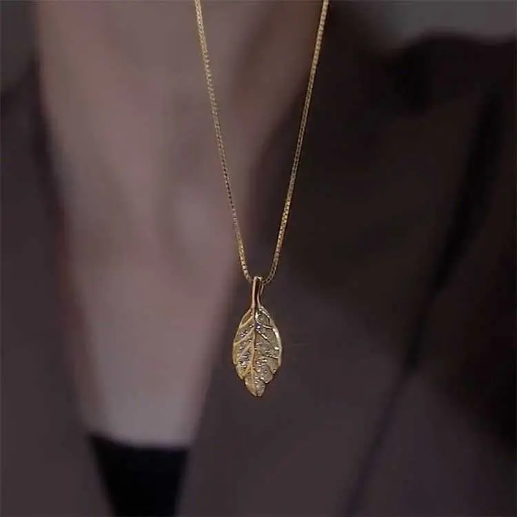 New Trendy Fashion Golden Branch Jade Leaf Necklace Women High-End Fashion Full Diamond Tree Leaf Titanium Steel Clavicle Chain HUI260928L23