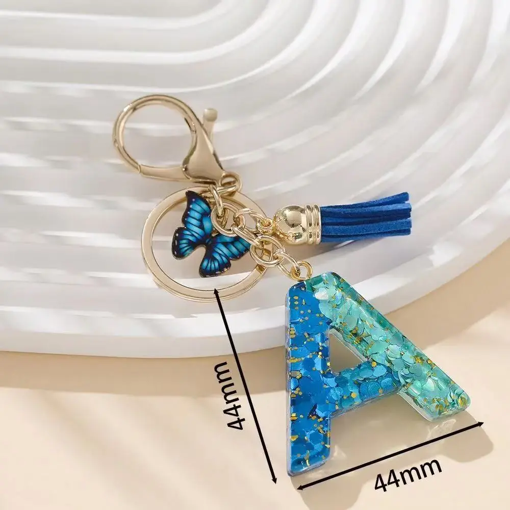 2026 Trendy Blue Butterfly Initial Keychain, Cute Fringe Tassel Bag Charm with Letter Pendant, Personalized Aesthetic Purse Accessory for Backpack, Handbag Decoration, Stylish Gift for Girls Women Everyday Use