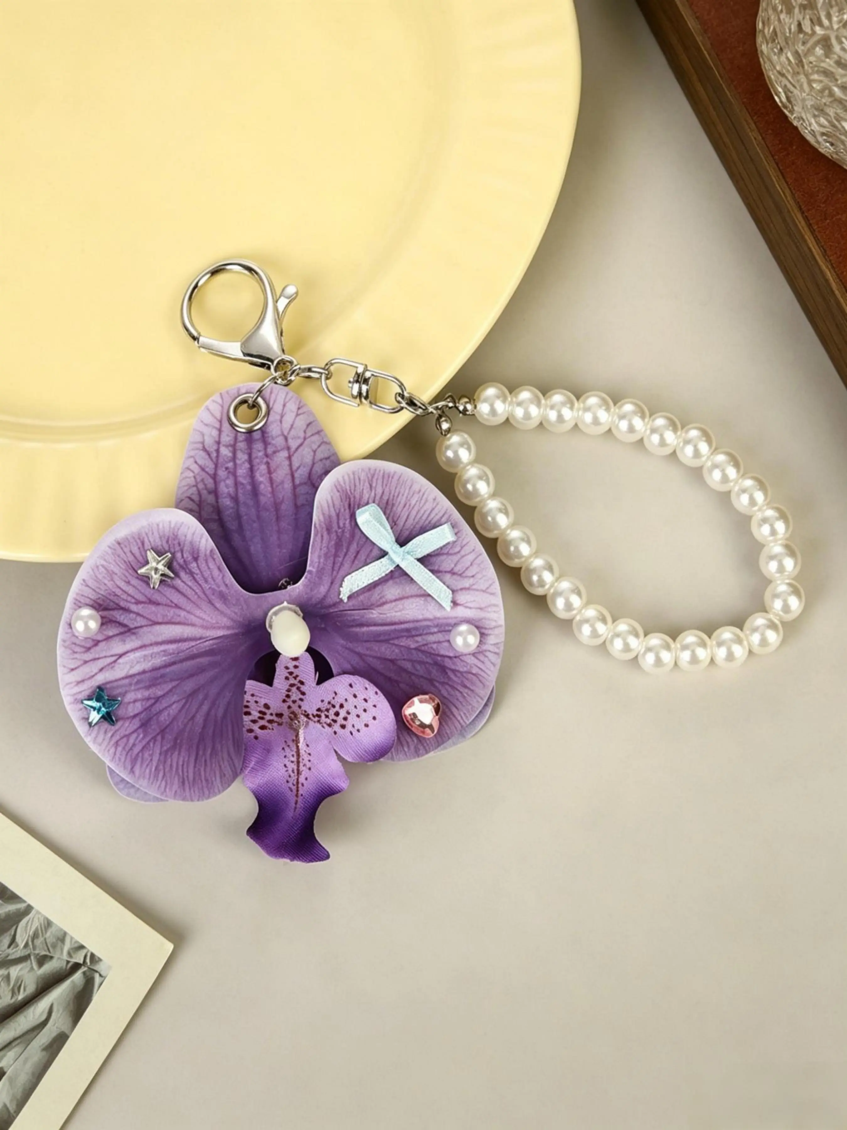 Artificial Purple Phalaenopsis Keychain with Mini Ribbon Bow Rhinestone & Pearl Chain, Silver Lobster Clasp Bag Charm, Romantic Floral Accessory for Women Handbag, Sweet Spring Gift