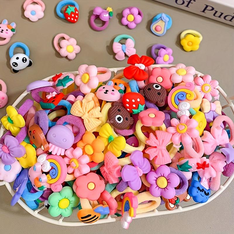 Baby Hairband Set! Available in packs of 50/80/120 pieces. Cartoon fruits, vegetables, animals, and flowers with bows. Plastic material, various colors