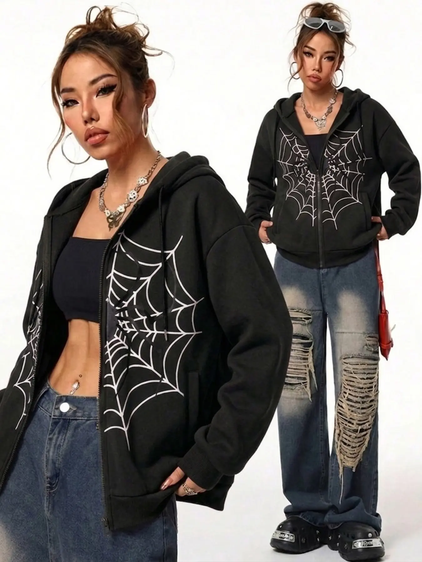 A loose-fitting black zip-up hoodie featuring a spiderweb print; warm, comfortable, and relaxed yet stylish—a versatile streetwear essential.