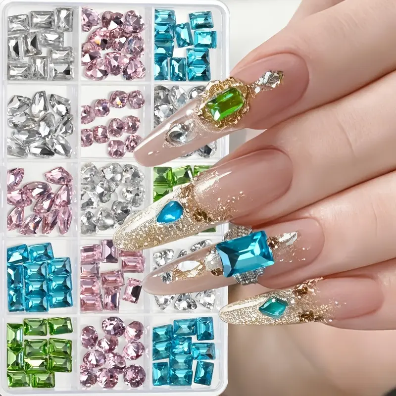 Set of 90 assorted-shaped and colored nail rhinestones, 15 compartments of flatback crystals (square, heart, teardrop, oval), in pink, blue, green, and clear, 3D nail decorations, perfect for DIY nails and nail salons.