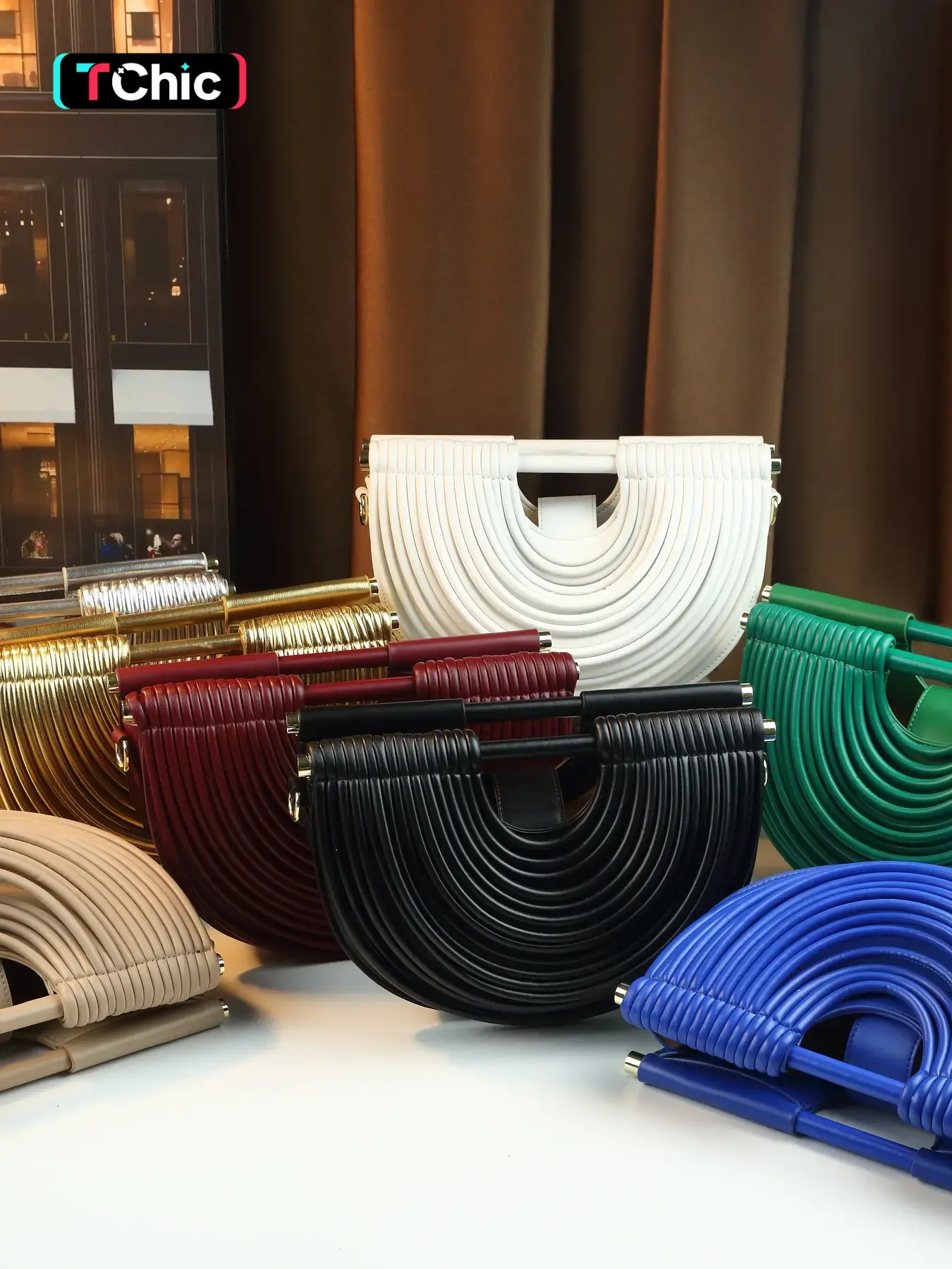 New cross-border fashion handbag women's high-end sense niche noodle design single shoulder crossbody half-moon bag