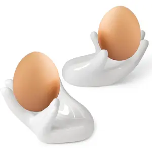 2 Pcs Creative Ceramic Egg Stands Porcelain Egg Holders Hand Shaped Egg Cups Holder for Hard Boiled Eggs for Living Room Restaurant Dining Table Breakfast Display