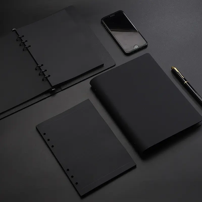 A5 black business notebook with a refillable loose-leaf design, featuring 80 sheets of high-quality black cardstock; a professional notebook suitable for office use and meetings.