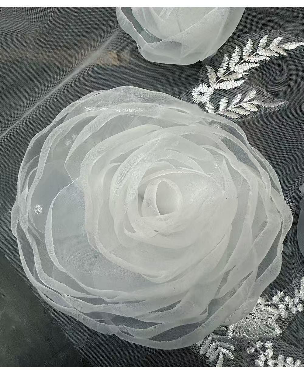 Luxury-style long veil with dreamy, elaborate floral designs and a cathedral-style train