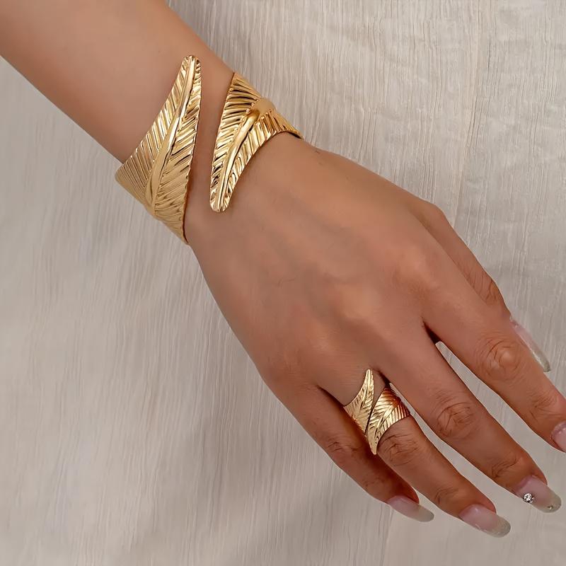 Elegant Gold Feather Textured Cuff Bracelet and Ring Set Nature Inspired Detailed Leaf Pattern Sophisticated Accessory Set for Fashion Enthusiasts and Formal Occasions Cross Necklace Surgical Steel Stud Earrings Mesh Water Drop Plated tiara Silver