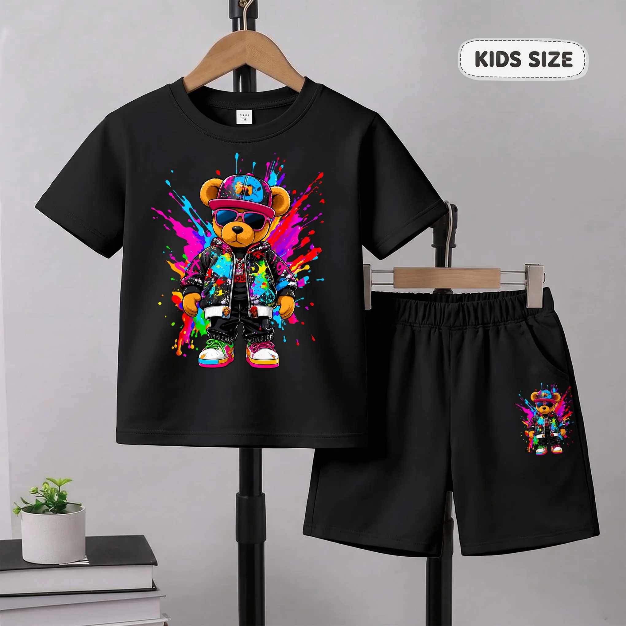 Kids’ Lyvani Luxe's ​​"Graffiti Bear" Print Short-Sleeve T-Shirt And Shorts Set—Casual Summer Kids' Clothing. This Round-Neck Outfit Combination Is Perfect For Everyday Wear And Outdoor Play.