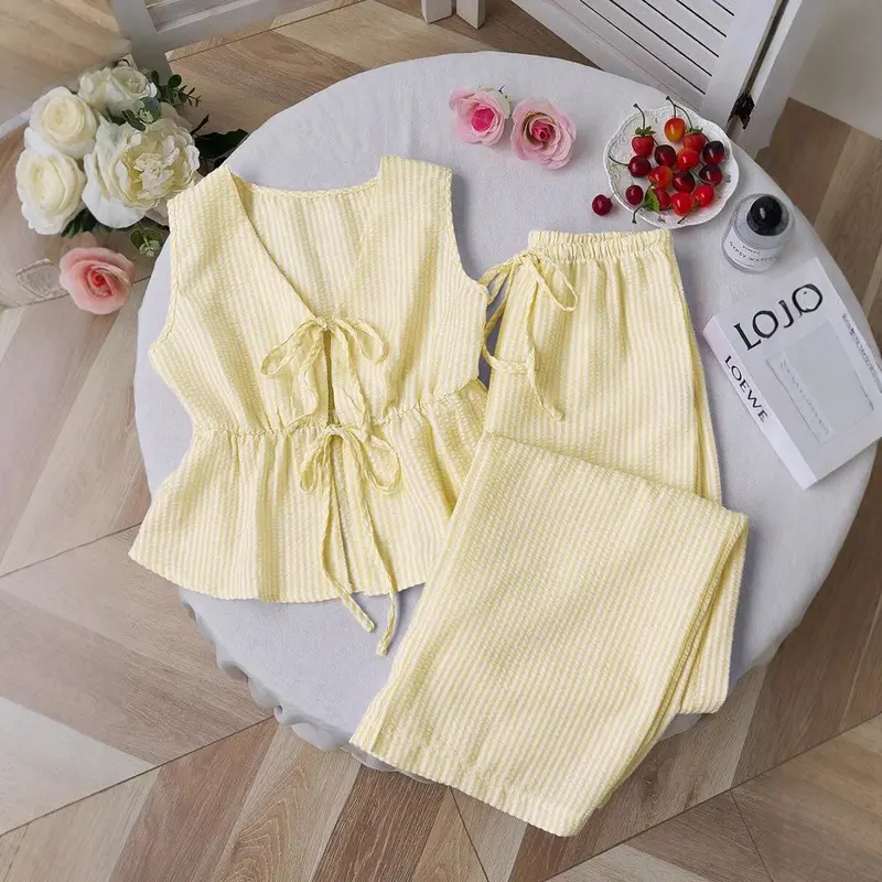 Women's two-piece summer outfit, solid color striped set, casual tie-up versatile tank top, loose-fitting tie-up solid color long pants, casual sweet outfit    （Translation note: The translation retains the original structure while adapting terms like "ti