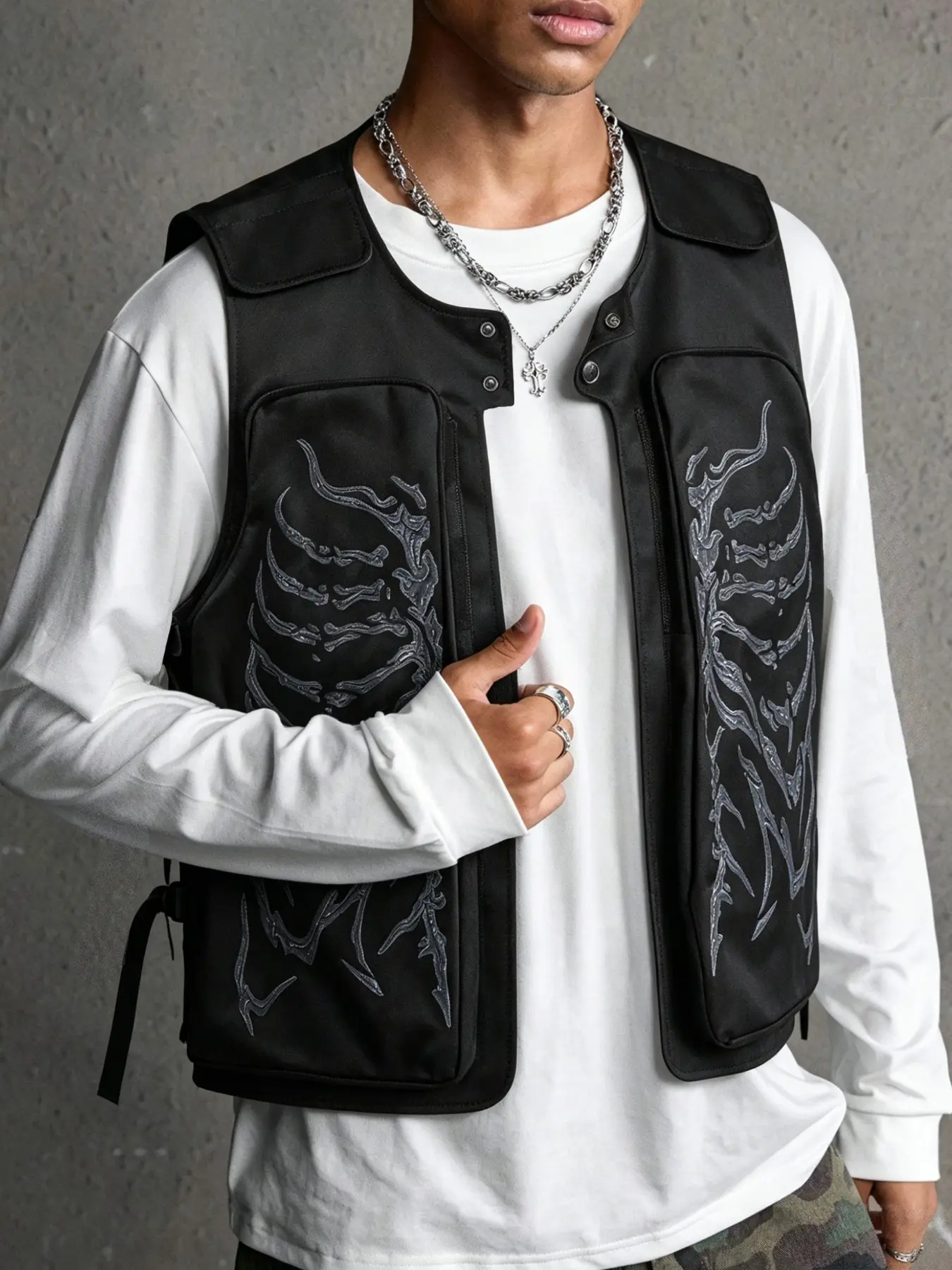 Y2K-style skull-print vest featuring a utilitarian techwear aesthetic; a bold, statement-making outer layer with intricate detailing—an essential piece for parties, performances, and street-style looks.