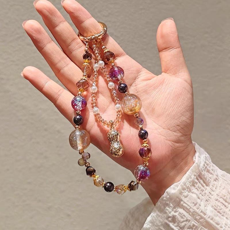 Luxurious and sophisticated mobile phone wrist strap with pink butterfly pendant, short style, niche and exquisite crystal chain, universal