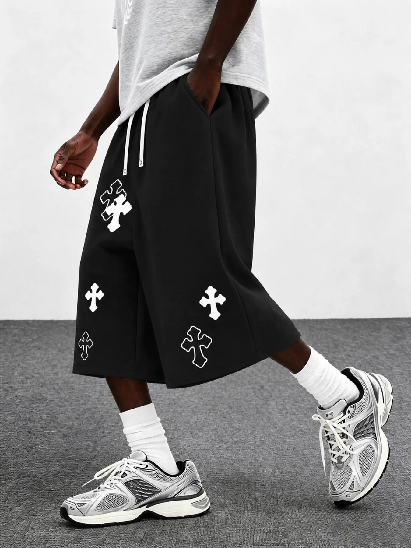 Men's Black Baggy Bermuda Shorts, Knee-Length Wide-Leg Drawstring Shorts with Bold White Cross Graphics, Retro Y2K Gothic Streetwear Bottoms for Summer, Campus Outfits, Skate Looks, Travel, Music Festivals, Casual Weekends, and Hip Hop Styling