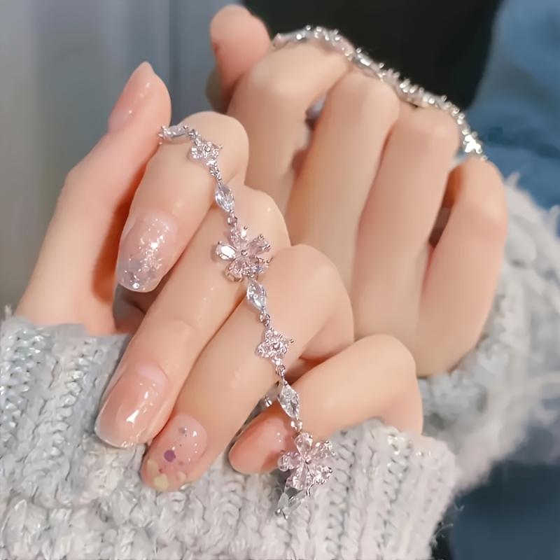 Adjustable Pink Cherry Blossom Bracelet - Elegant Bohemian style petal design, inlaid with sparkling synthetic zircon, delicate chain link jewelry, suitable for daily wear and gift giving, women's jewelry, exquisite craftsmanship