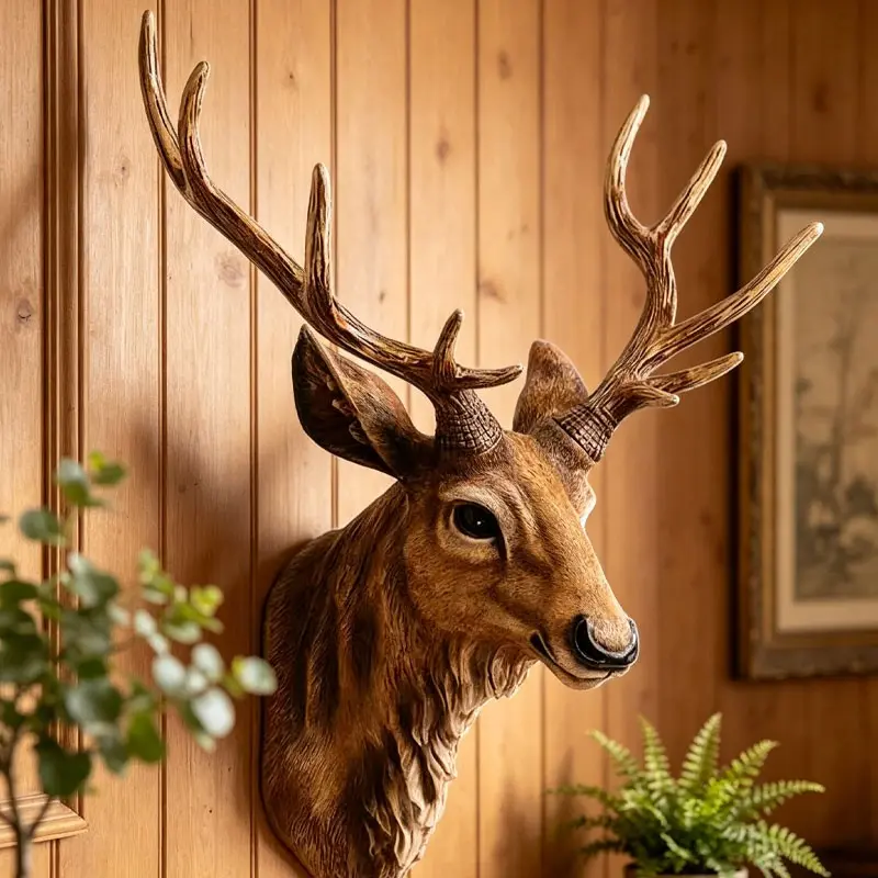 One three-dimensional deer head resin decorative piece for wall hanging. Suitable for living room, entrance hall, and bar decoration. Three-dimensional wall hanging decoration.