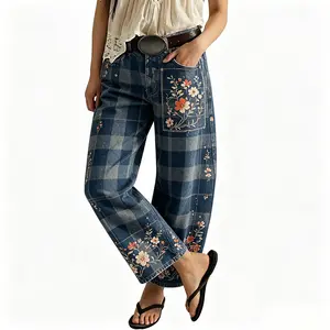 Women's vintage-wash wide-leg jeans; Y2K-style loose-fitting trousers; soft pink base with a bohemian floral print; suitable for year-round outdoor activities and streetwear styling.