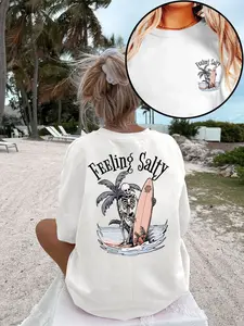 Women's casual loose-fit round-neck short-sleeve T-shirt with "FEELING SALTY" surf skull print, high elasticity, machine washable summer beach top, perfect for beach vacations, relaxed and stylish, breathable trendy T-shirt, a must-have for beach lovers