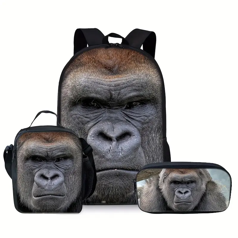 🦍 Wild Vibe: This 3-piece set features an ultra-realistic silverback gorilla face design on a black background, perfect for young animal lovers!The backpack, lunch bag, and pencil case all have the same striking print.