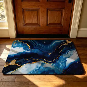 A rectangular blue and gold marble-patterned entryway mat with a soft, machine-washable design. Suitable for use as a dirt-resistant mat at the entrance, in bedrooms, bathrooms, or beside the bed; as a decorative mat in living rooms; or as a dining
