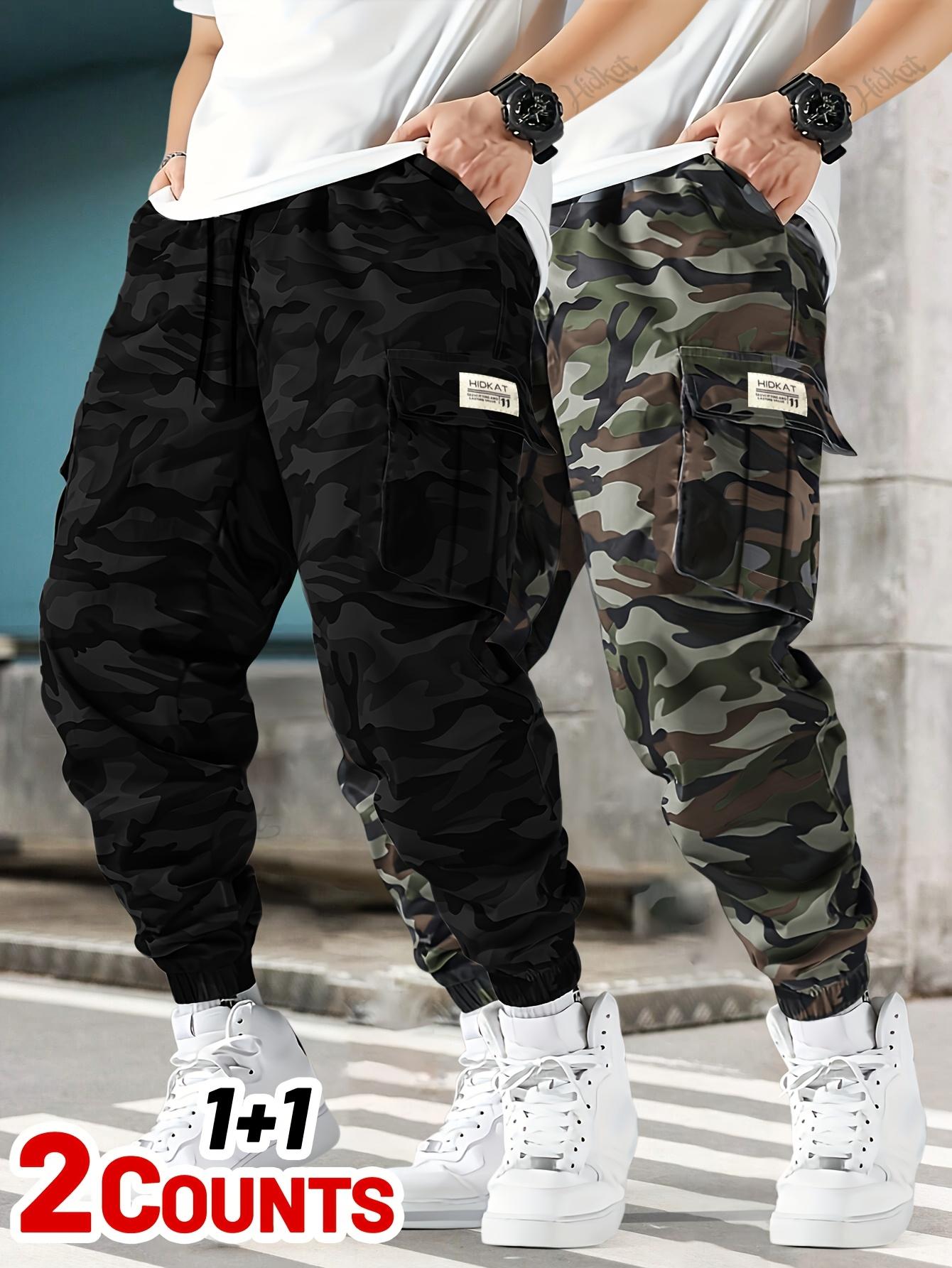 Men's 2-piece camouflage workwear, ankle tied casual pants Multi pocket drawstring elastic waist loose sports work pants two-piece set Outdoor military style camouflage work pants 2-piece combination