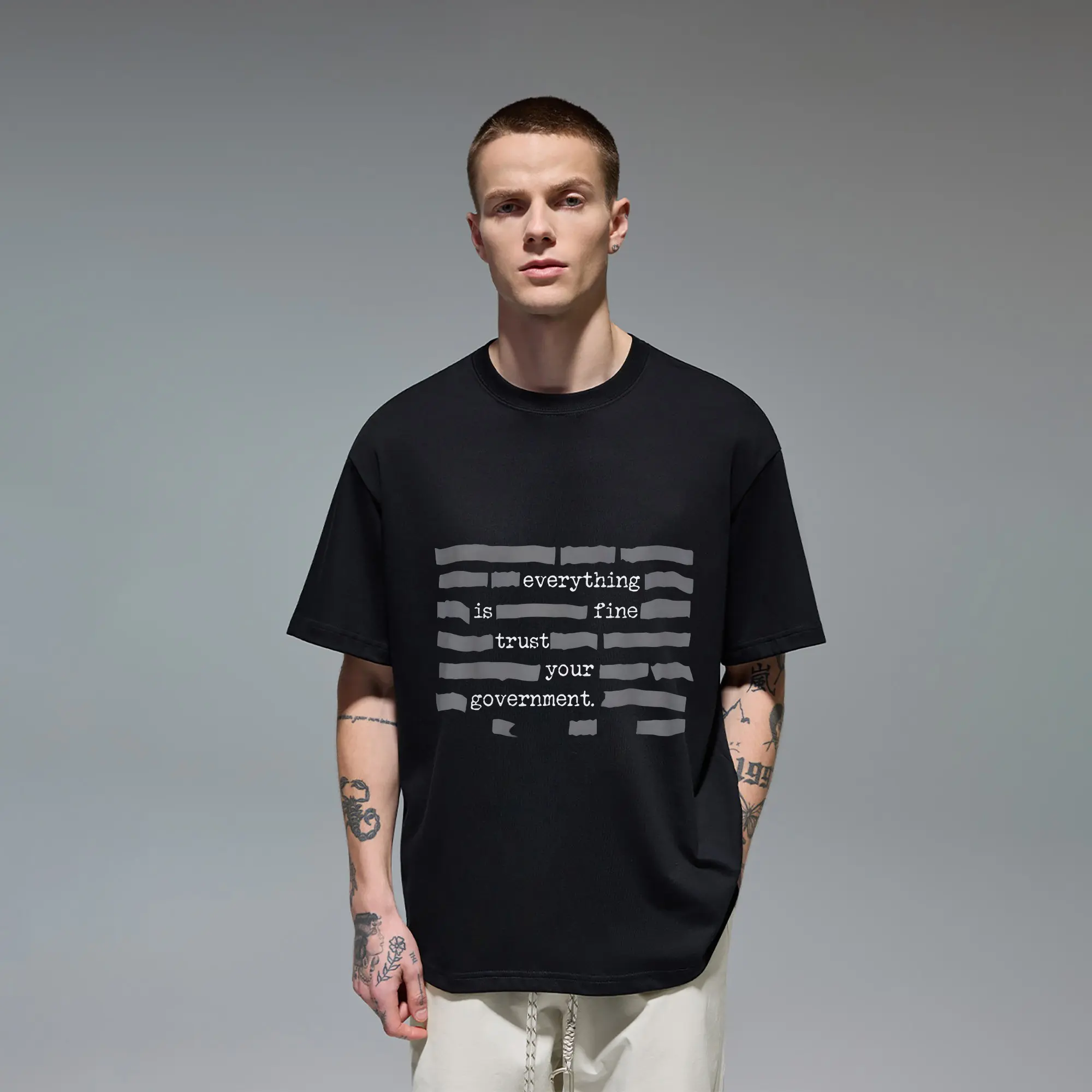 Sarcastic statement Men's T‑Shirt built from Quality Cotton, printed with "everything is fine trust your government" covered by redacted tape effect. Skin‑friendly relaxed‑fit cut, lightweight comfy fabric for irony‑loving wearers for everyday casual outi