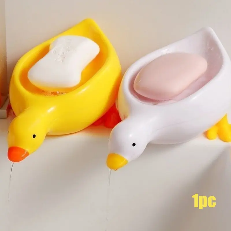 1 Cute Duck Soap Dishes – Yellow and White Oval Plastic Bathroom Sink Holder; Slanted Drainage Design Prevents Water Pooling; Decorative Bathroom Accessory; Compact, Lightweight, Space-Saving, and Easy to Maintain.
