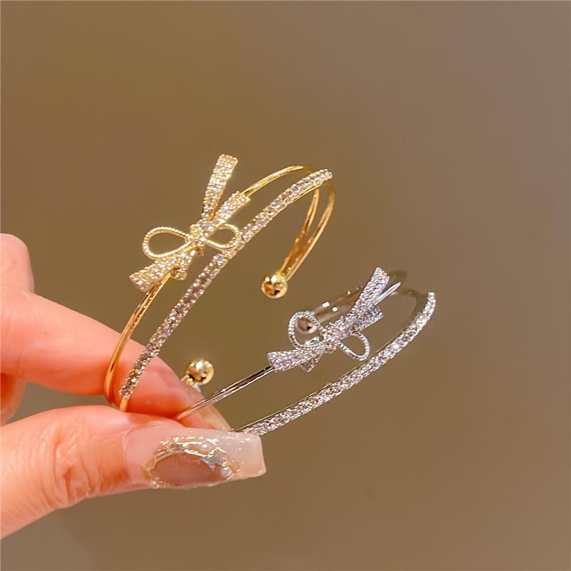 Elegant Gold Bow Bracelet with Synthetic Cubic Zirconia Inlay, Women's Open Design Bracelet for Casual and Special Occasions