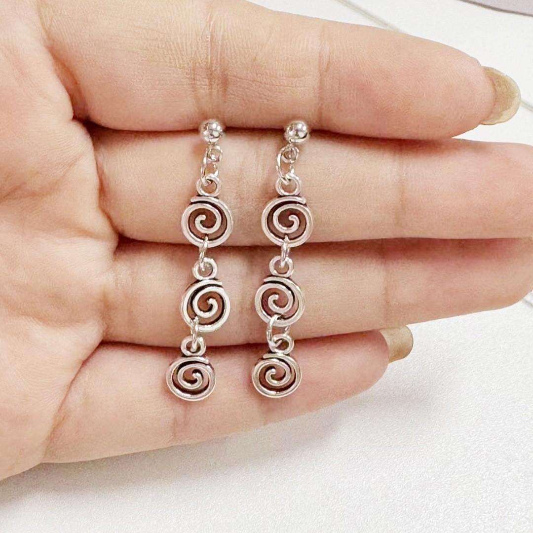 Vintage spiral earrings with distressed design, mosquito incense holder pendant, swirling long fringed earrings