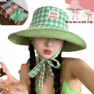 A reversible plaid-patterned tied fishing hat, Fisherman Hat, a large-brimmed outdoor summer and autumn hat for women, with double-sided sun protection, double-sided plaid pattern, lightweight UV protection, and foldable large brimmed sun hat