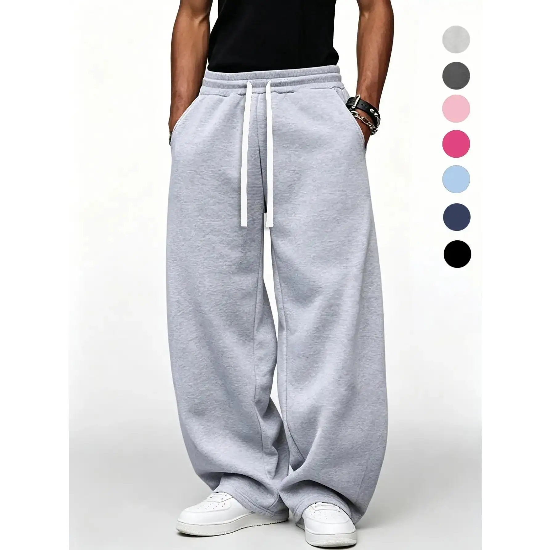 Men’s loose athletic pants featuring a relaxed casual design, elastic waistband with drawstring, wide-leg fit with pockets, comfortable for everyday wear; sports bottoms; drawstring-waist athletic casual wear; soft, comfortable athletic pants; sporty casu