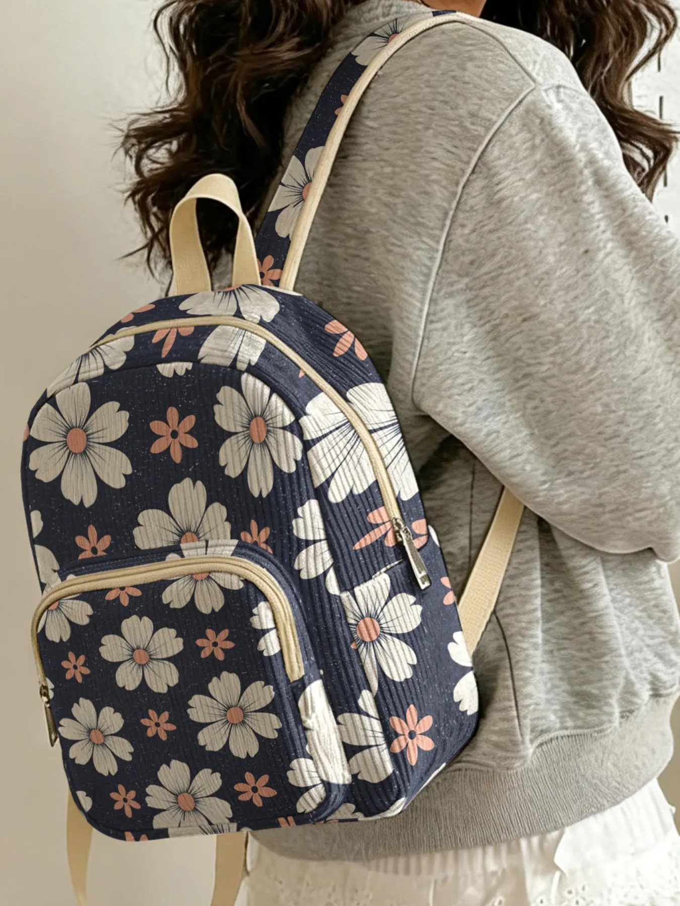 White and Orange Small Daisy Floral 2D Print on Navy Background, Corduroy textured, multi compartment storage, Casual Printed Backpack. Great for school and short trips, stylish and practical.