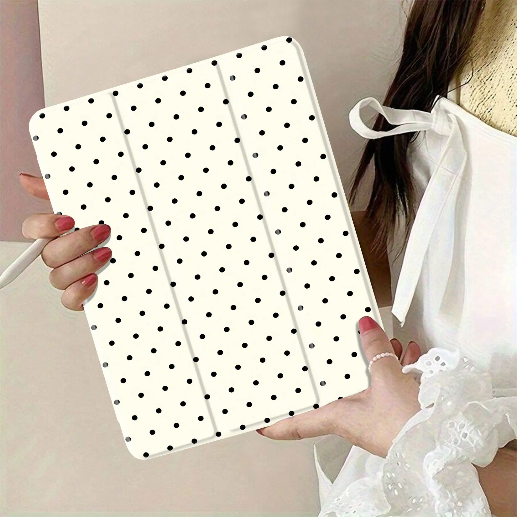 polka dot fabric pattern in black and cream color suitable for crafts sewing home decor or fashion projects