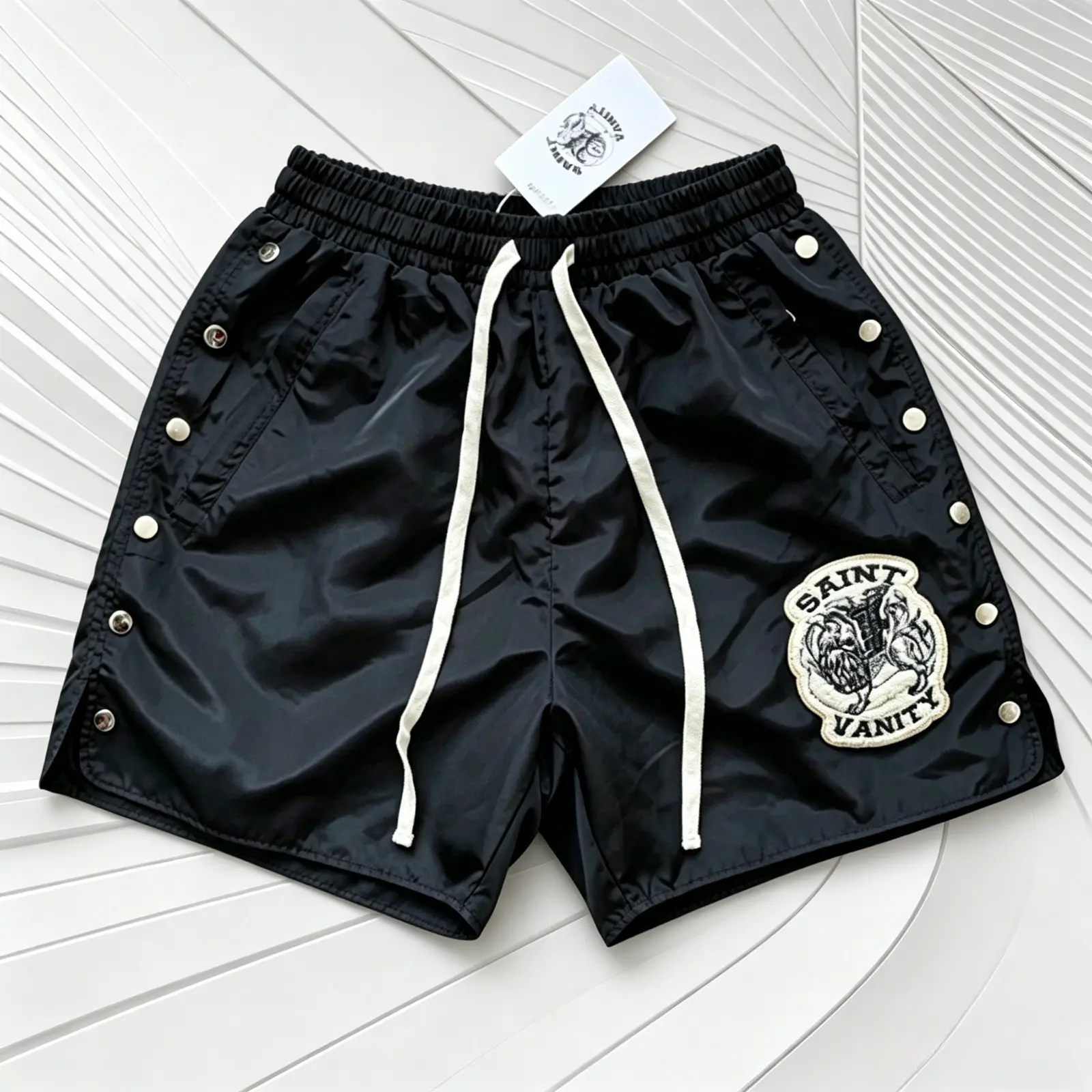SAINT VANITY Black Polyester Streetwear Shorts for Men Women Y2K Baggy Gym Shorts Side Snap Button Lion Patch Graphic Drawstring Summer Casual Athletic Running Skate Hip Hop Harajuku Oversized Festival Vacation Outfit Unisex