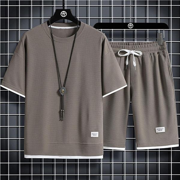 Textured waffle fabric short sleeve crew neck top matched with drawstring knee-length shorts, layered trim minimalist design, lightweight breathable daily co-ord set to craft relaxed casual summer looks and elevate clean modern mensfashion