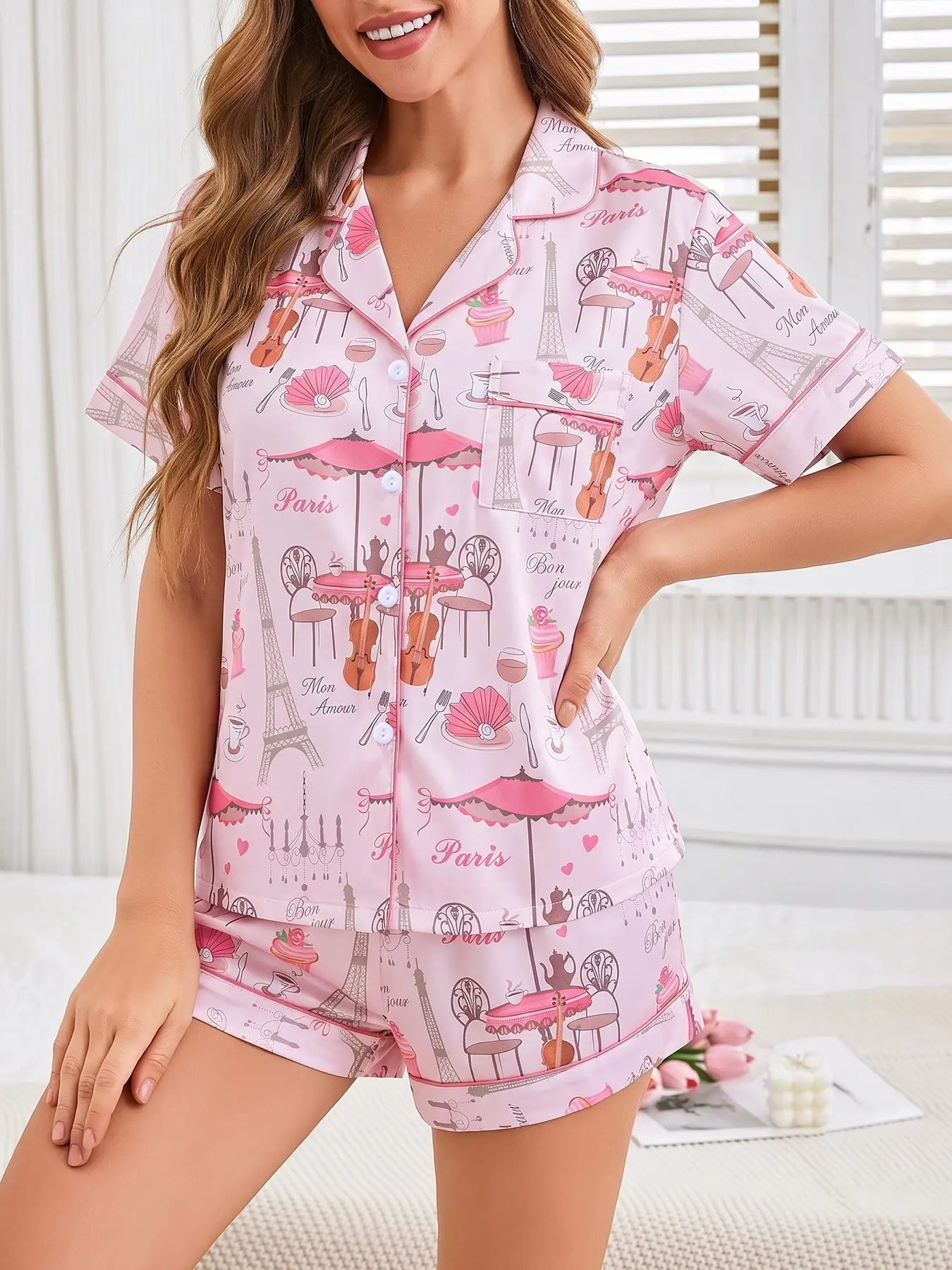 Women's 2-piece pajama set, light pink base with Eiffel Tower, coffee, dessert & violin print, romantic French style, pink piping trim. Lapel top with chest pocket, soft elastic shorts, all-season casual loungewear for women