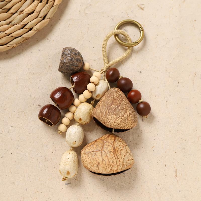 Naturally handcrafted fruit shell bell, with seeds, sound therapy handbell, wish-fulfilling fruit bag ornament, Yunnan specialty gift, mobile phone decoration accessory