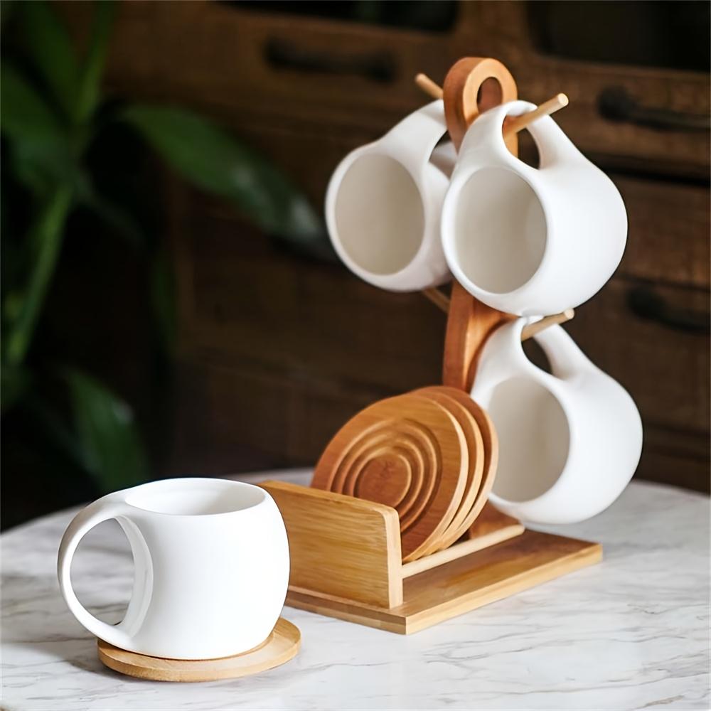 Faridabio 1 Set of Mug Stand And Coaster Set Includes a Ceramic Coffee Cup And Saucer, Perfect for Coffee Shops. This Set Features a Mug, a Coaster, And a Cup Holder, with Each Cup Holding 200Ml Or 7 Oz