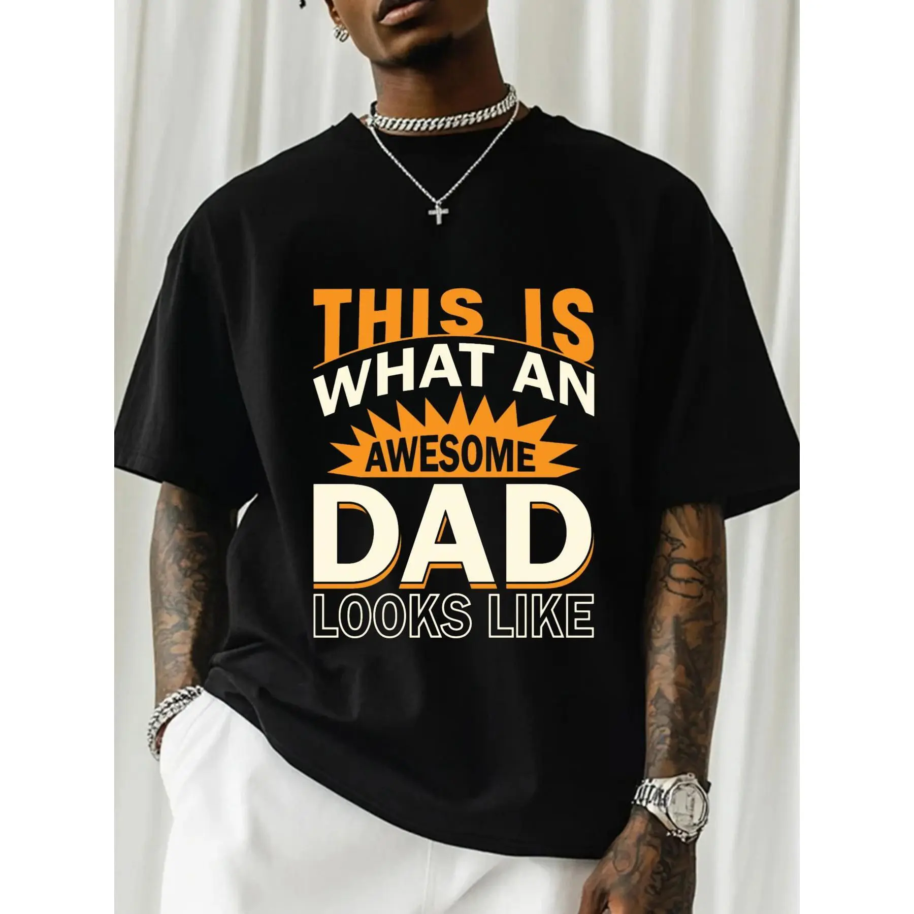 Super Dad Graphic T-Shirt. Boasts bold, eye-catching prints and a distinctive trendy design. It is an excellent gift choice for Father's Day and birthdays, perfect for dads with personality. This crew neck short sleeve tee is made of slightly stretchy fab