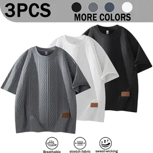 4 Colors Available Men's 3D Diamond Jacquard Crew Neck Short Sleeve T-Shirt, Small Leather Label On Side Loose Drop Shoulder Lightweight Breathable Textured Solid Color Minimalist Versatile Summer Casual Half Sleeve Base Top