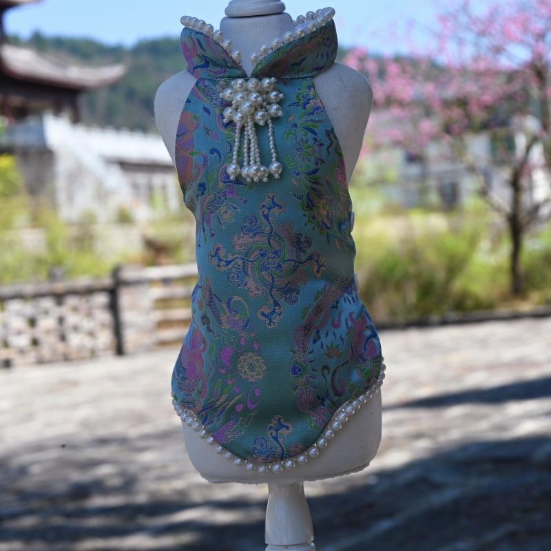 Paws Trendy Pet Spring & Summer Qipao for Dogs & Cats, suitable for Teddy, Bichon Frise and other small dogs. Features embossed fabric with exquisite retro frog buttons, fine workmanship, exuding noble elegance and making your beloved pet stand out.