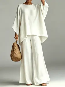 D4613 Bohemian Two-Piece Outfit, Loose Batwing Sleeve Top with Asymmetrical Hem, High Waist Wide Leg Pants, All-Season Lightweight Wear.