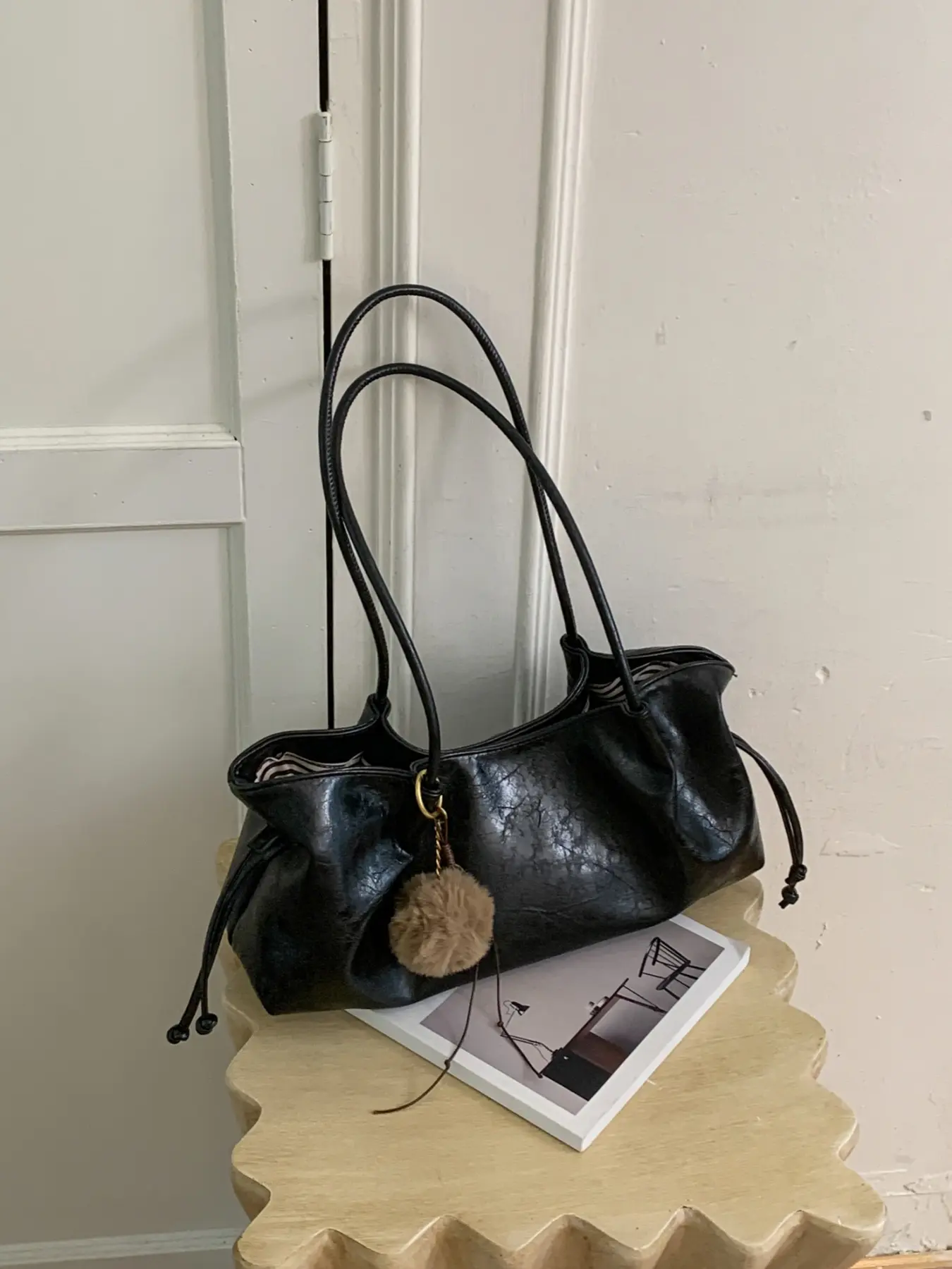 Vintage elegant crack texture drawstring handbag, with pom-pom pendant niche lazy style ladies bag, daily commute dating shopping fashionable shoulder bag