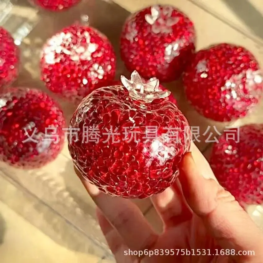The same red pomegranate noisy ball pinch hand ball decompression creative high-value pinch toy gift