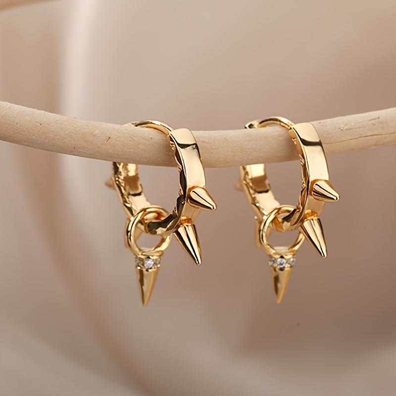 A pair of gothic stud earrings, unisex and neutral style, hip-hop ear studs, party and gathering decorative accessories