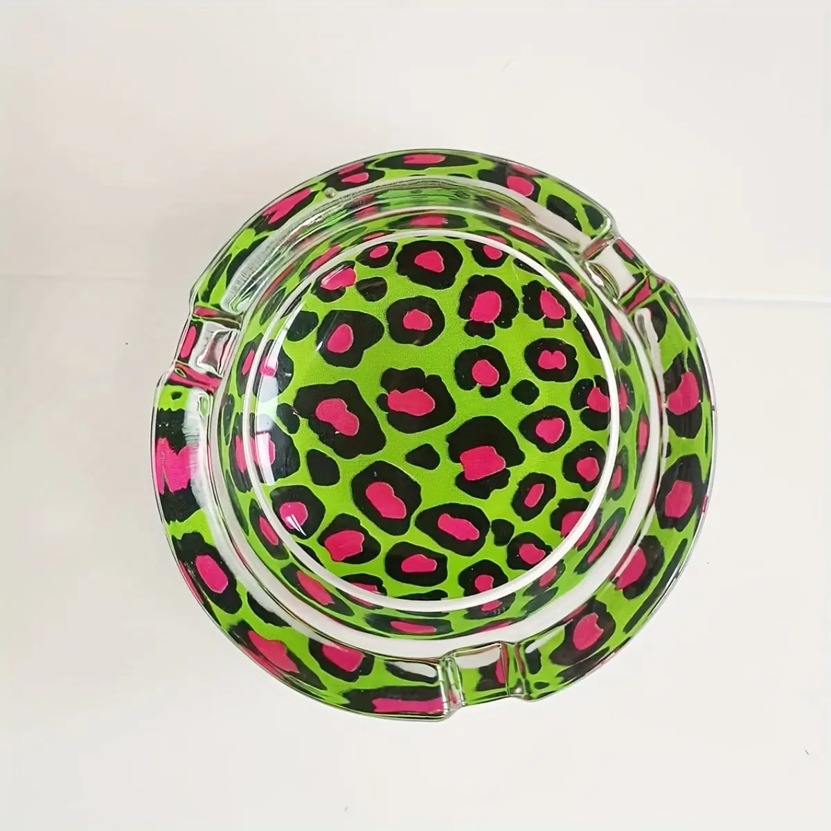 1 round glass ashtray with anti slip base and adorned with pink, black leopard print art patterns, ideal for homes, bars, Interior decoration accessories - a artistic home decor ashtray designed for fantasy and art enthusiasts